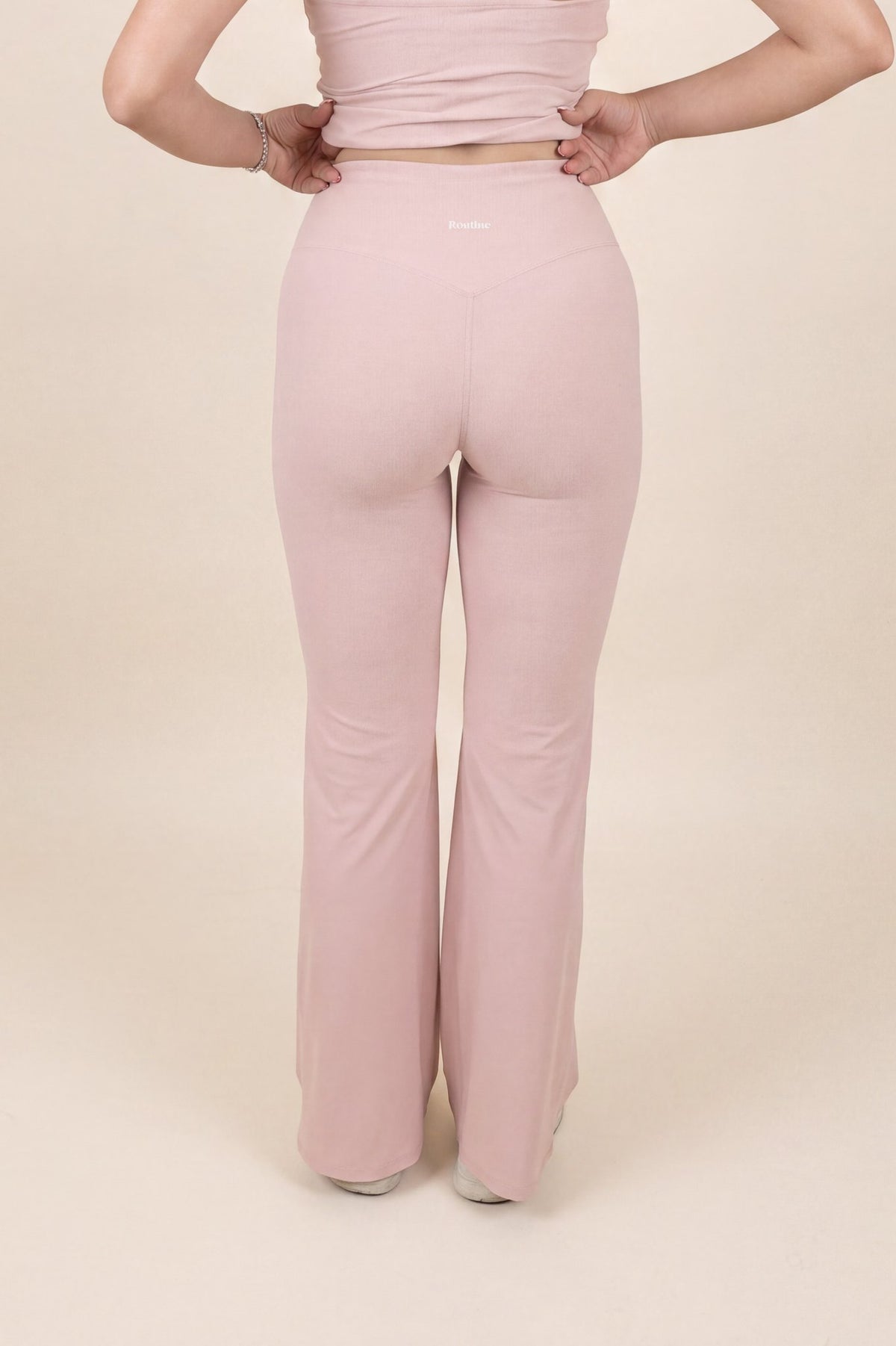 Routine Flared Pants in Ballerina Blush - back waistband detail